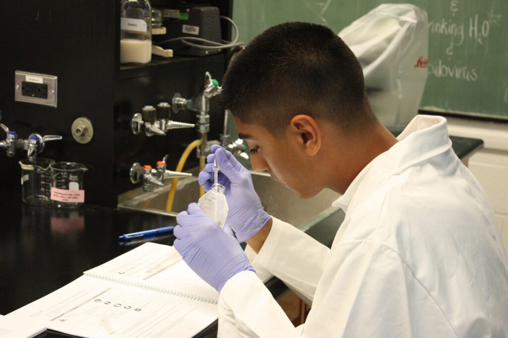 Student doing lab experiment